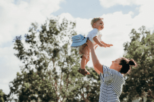 Caroline and Child playing in park