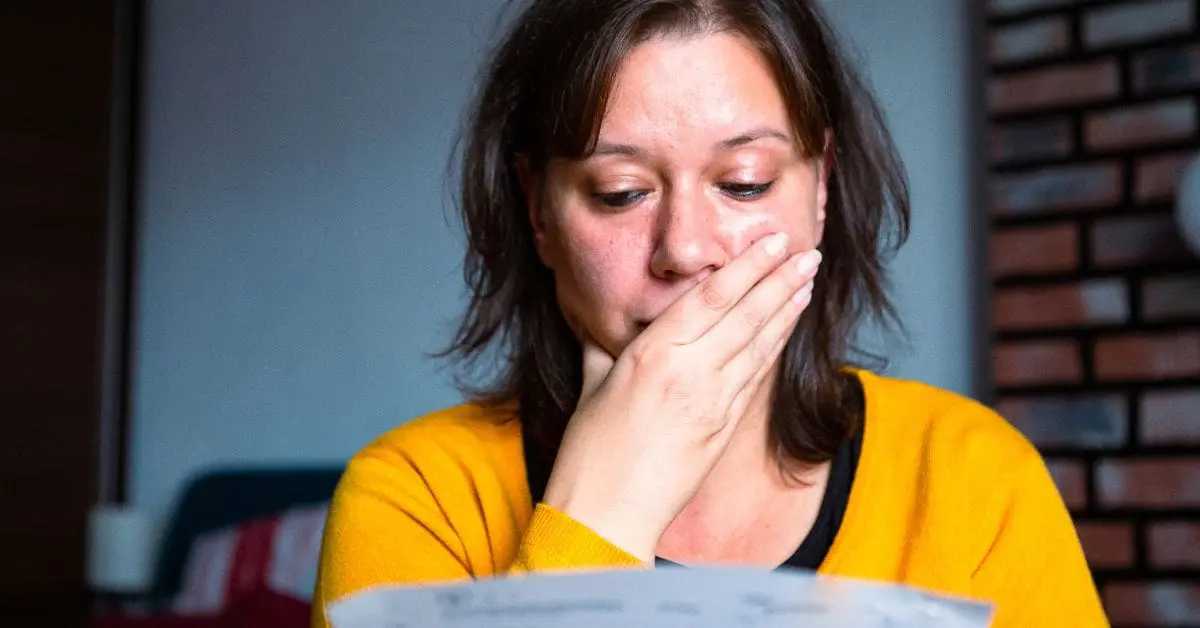 Aisling's story -woman at risk of homelessness reading rent fees